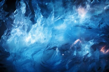 Obraz premium A surreal image of flames made of ice, with cool blue flames flickering in a sea of icy tranquility.