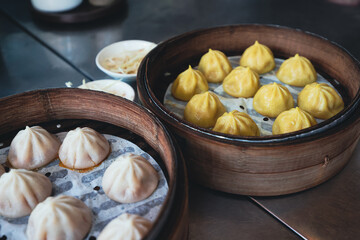 Fresh Dumplings in Traditional Round Chinese bamboo plate 