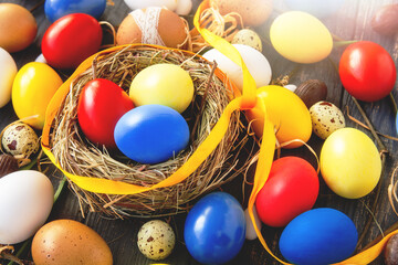  Happy Easter Holiday background with multicolor painted Easter eggs in nest, template, banner, card.