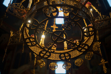 Golden chandelier in Temple. Interior of Church. Beautiful object.