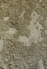 Texture of the old embossed concrete wall in gray color. Background image of a concrete product