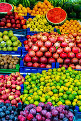 Variety of fresh fruits put out on sale on the street stall