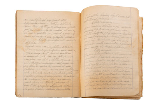1930s ruled notebook with elegant cursive writing in pencil of Italian science theme on pages yellowed by time. Isolated top view