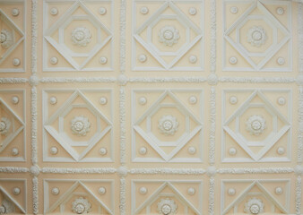 The pattern on the building. An old decoration. Architectural detail