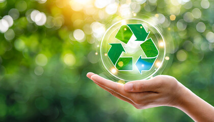 hand holding reduce reuse recycle symbol on green bokeh background ecological and save the earth concept an ecological metaphor for ecological waste management and a sustainable - obrazy, fototapety, plakaty