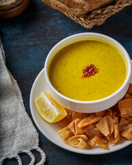 Close-up of lentil soup on a wooden floor