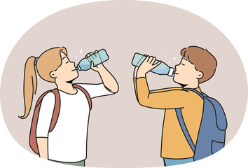 Children drinking fresh water from bottles