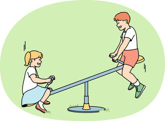 Children ride on teeter-totter at playground in summer.