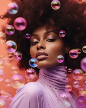 Fashion-forward model poses with striking makeup, surrounded by colorful reflective soap bubbles on a plain backdrop