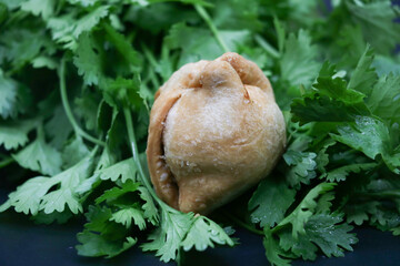 Samosa or singara,traditional fried or baked food isolated on black background..