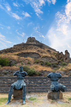 Gori historic Castle ruin and statues in Gori, Georgia. The ancient castle is a tourist attraction in Gori