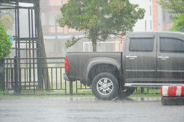 Heavy rain on the road, Car on the road with heavy rain
