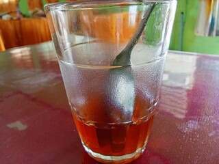 glass of cola with ice