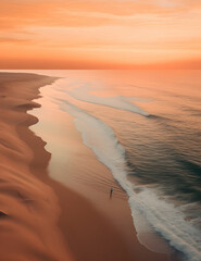 A person walking on the beach at an orange sunset, in the style of hyper-realistic water,  aerial view