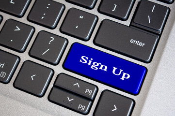 Sign up text on blue keyboard. Sign up and online registration concept.