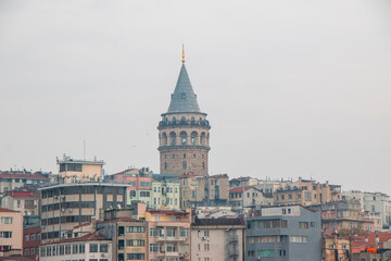 Fototapeta premium Galata Tower in Beyoglu district and old houses. Istanbul, Turkey