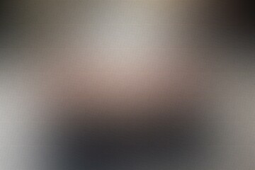 Abstract background with blurred spots of light in gray and brown colors