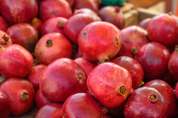 fresh juicy pomegranates at the bazaar on the island of Cyprus in autumn 2