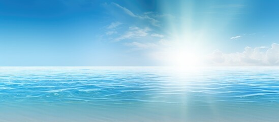 In the abstract and enchanting background of nature the summer sun radiates a soothing blue color...