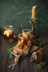 Fototapeta na wymiar Apple cider is an autumn warming drink