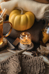 Autumn composition with a beautiful candle