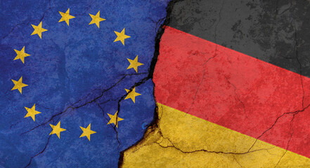 European Union and Germany flags, concrete wall texture with cracks, grunge background, military conflict concept