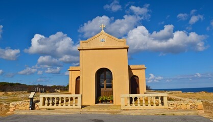 Obraz premium Chapel of the Immaculate Conception on a sunny day with cloudy sky background