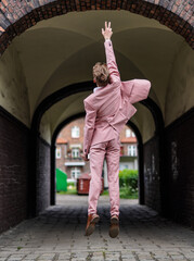 A superman in pink suit
