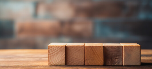 A stack of wooden blocks cube on top of a wooden table. Copy space, Business art concept - obrazy, fototapety, plakaty