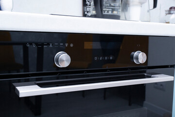 Sensor built-in electric stove in the kitchen. Washing and cleaning of the electric stove.