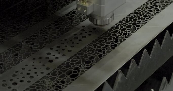 Automatic laser cutter at work