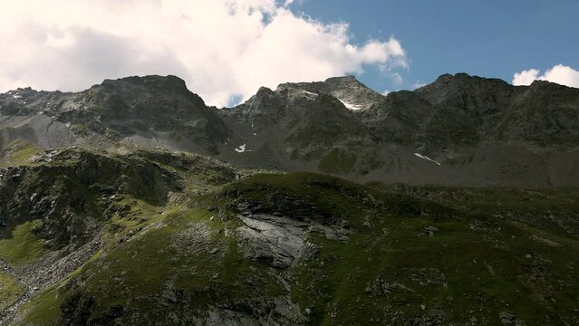 Drone aerial approaching of Pizzo Tambo in Val Loga Montespluga Italian Alps
