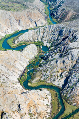 Aerial view of the confluence of  of the Krupa and Zrmanja Rivers and their canyons, Croatia