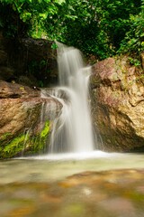 Vertical shot of Villa Miriam waterfall in Barahona, Dominican Republic