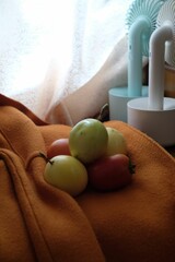 Vertical shot of Passion fruits on a brown cloth
