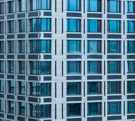 Fototapeta na wymiar New building exterior, skyscraper facade
