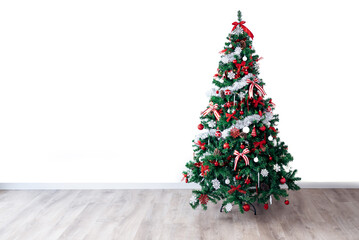 Beautiful modern Christmas decoration tree home, white background with empty copy space for text.