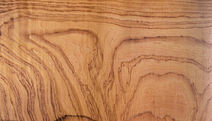 Real wood grain background with a regular structure. Background used as a texture or graphic asset