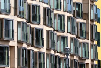 Obraz premium Beautiful house facade with many metal windows in Berlin, Germany