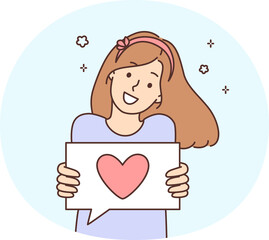 Smiling girl show heart on paper