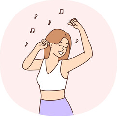 Smiling girl dancing to music