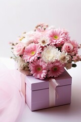 Naklejka na ściany i meble Beautiful bouquet of rose and chrysanthemums flowers and pink gift box on white table background. Gift for holiday, birthday, Wedding, Mother's Day, Valentine's day, Women's Day. Floral, Generative AI
