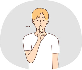 Man holding finger at lips ask for silence