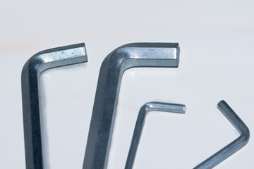 hexagons of different sizes, silver, top view.
