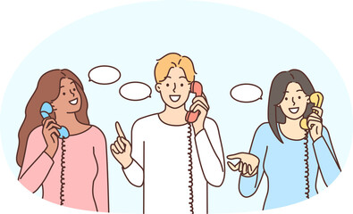 Smiling diverse people talk on landline phones