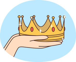 Person hands holding gold crown