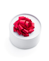 Gift box with red ribbon isolated on white