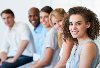 Woman, portrait and smile in seminar, office and collaboration or teamwork, workshop and meeting. Happy people, confidence and positive mindset at company, future and growth or face in boardroom