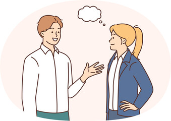 Fototapeta premium Smiling employees talking discussing ideas