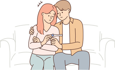 Problem of infertility in man and woman sitting on couch with negative pregnancy test in hands